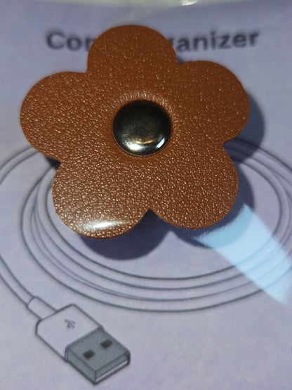 Flower-shaped cord organizer