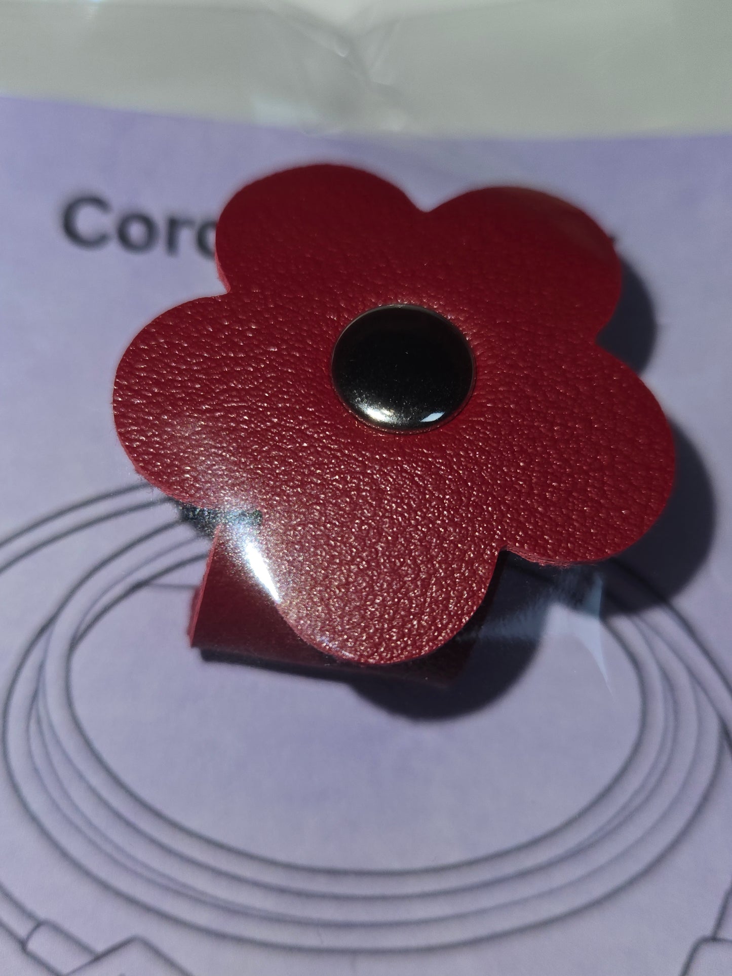 Flower-shaped cord organizer