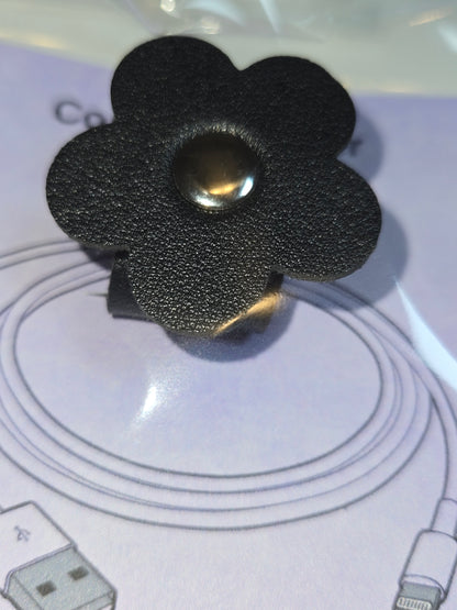 Flower-shaped cord organizer