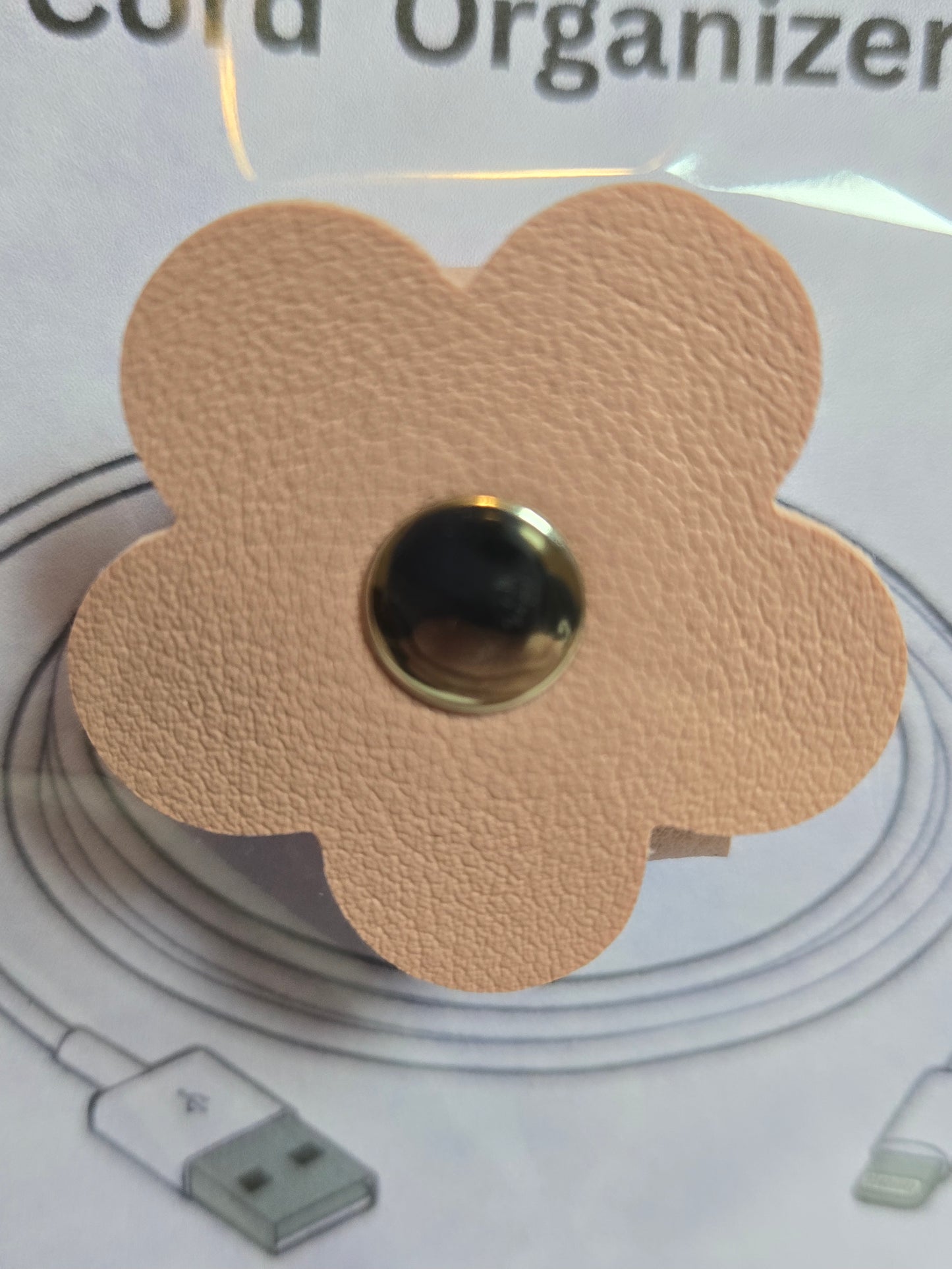 Flower-shaped cord organizer