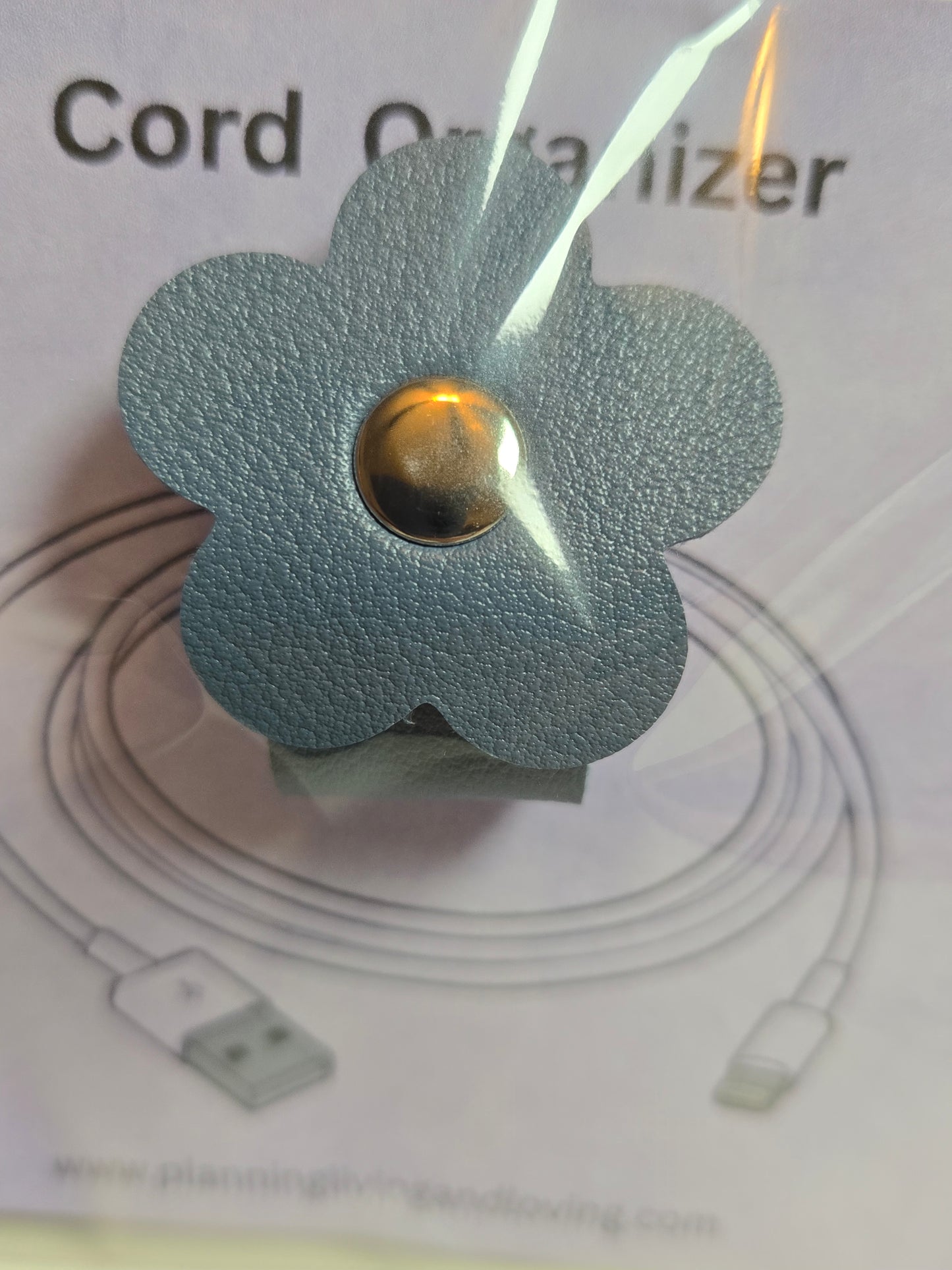 Flower-shaped cord organizer